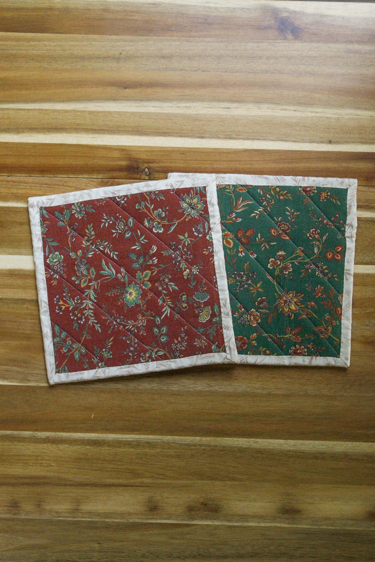 The Sacrifice Of Flowers Hot Pads (Set of 2)